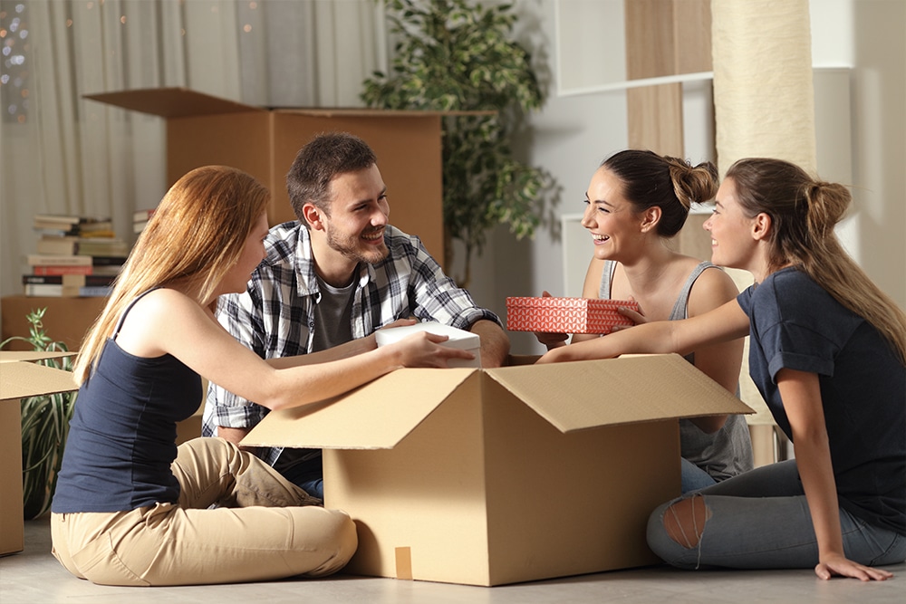 Picture of a man and three woman smiling