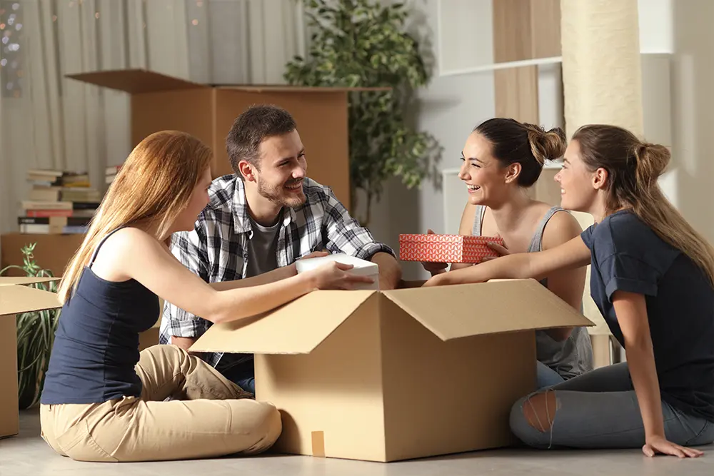 Picture of a man and three woman smiling